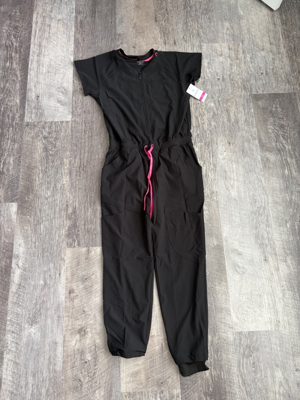 Med Couture Black Scrubs Jumpsuit with Pink Drawcord